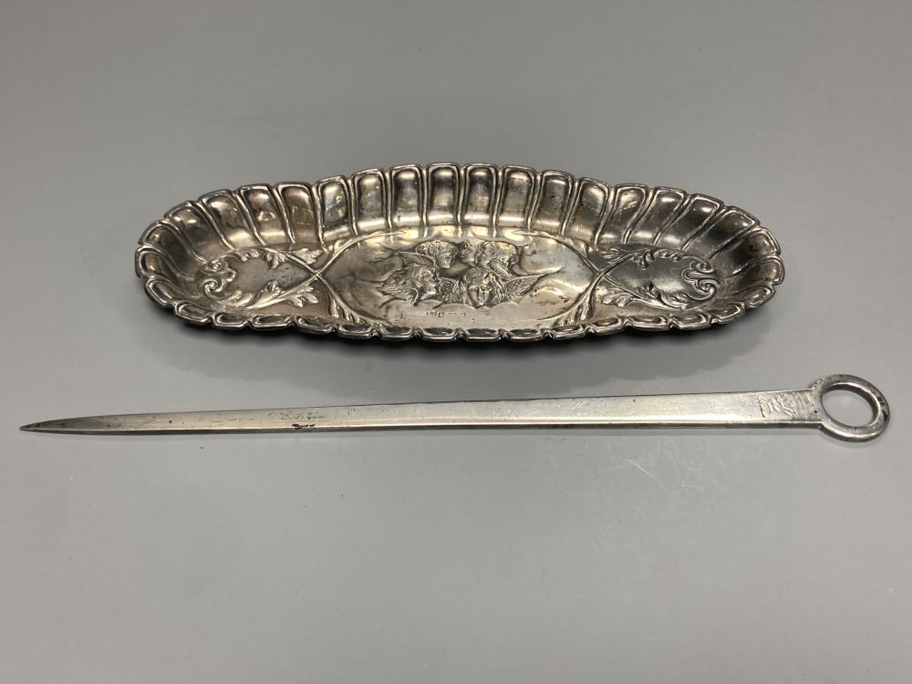 A George II silver meat skewer, John Harvey I, London, circa 1750, 28.5cm and an Edwardian silver Reynolds Angels pin tray,
